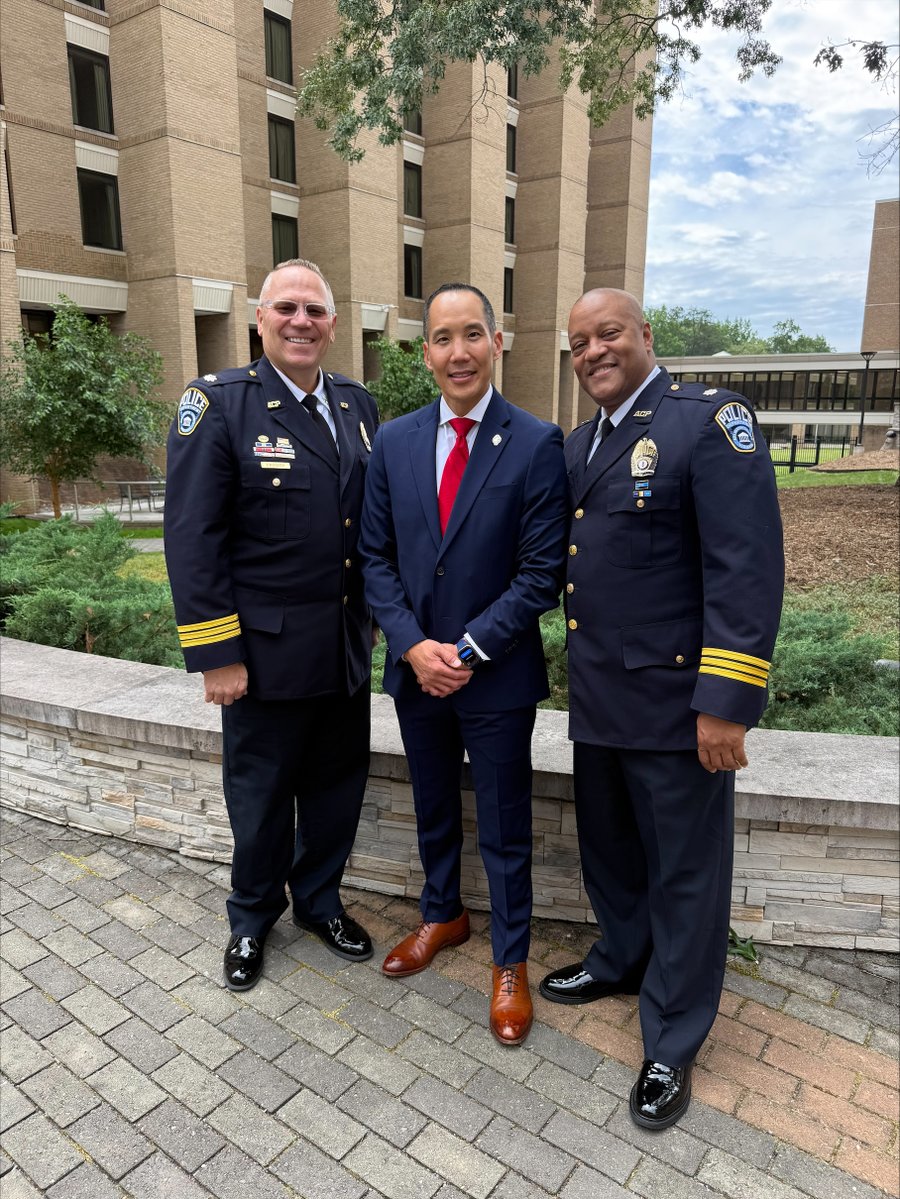 Deputy Chief Cassedy, Captain Kim and Deputy Chief Vincent pose together outside the FBI National Academy graduation.