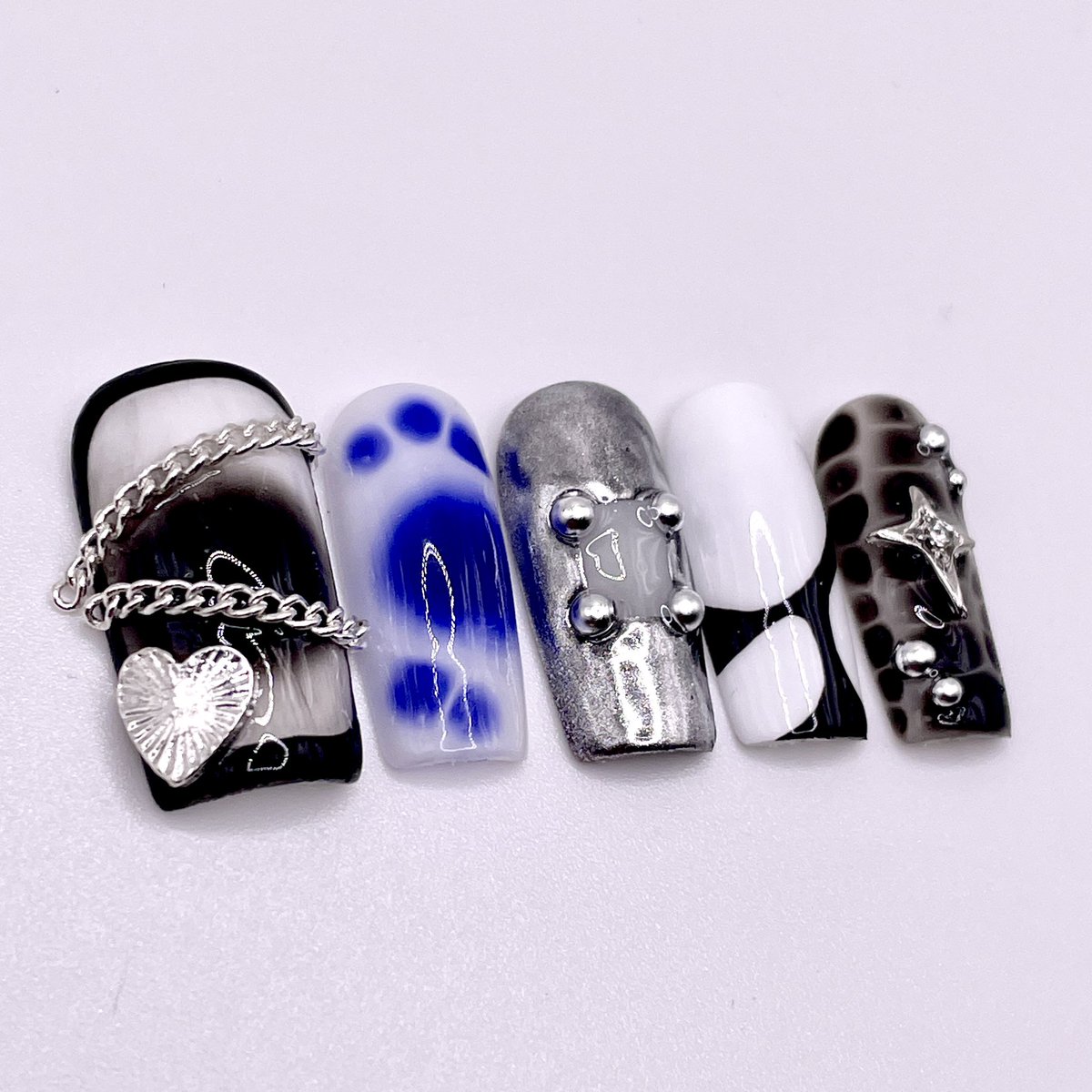 JIMlNS's tweet photo. ur unemployed friend on a tuesday that picked up a random hobby after buying 3 gel polishes in december talking abt “just so i can paint my plain black nails &amp; not have them chip quickly” https://t.co/mhCueHf1Sb