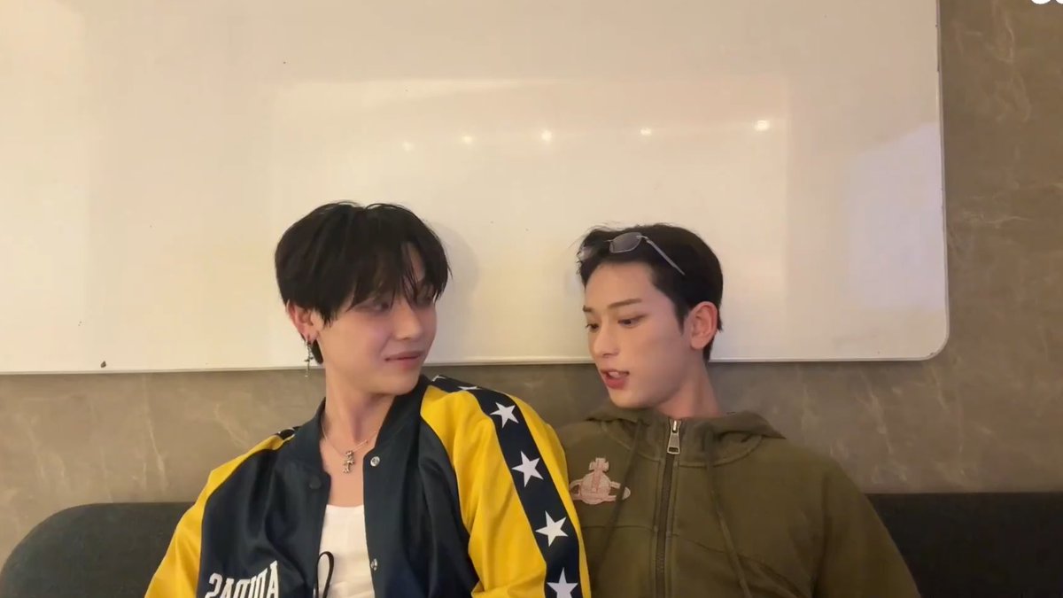 nicoruas's tweet photo. complaining about the room temperature being 'too hot' but they’re literally sitting attached at the hip like this https://t.co/RIlxrkQukX