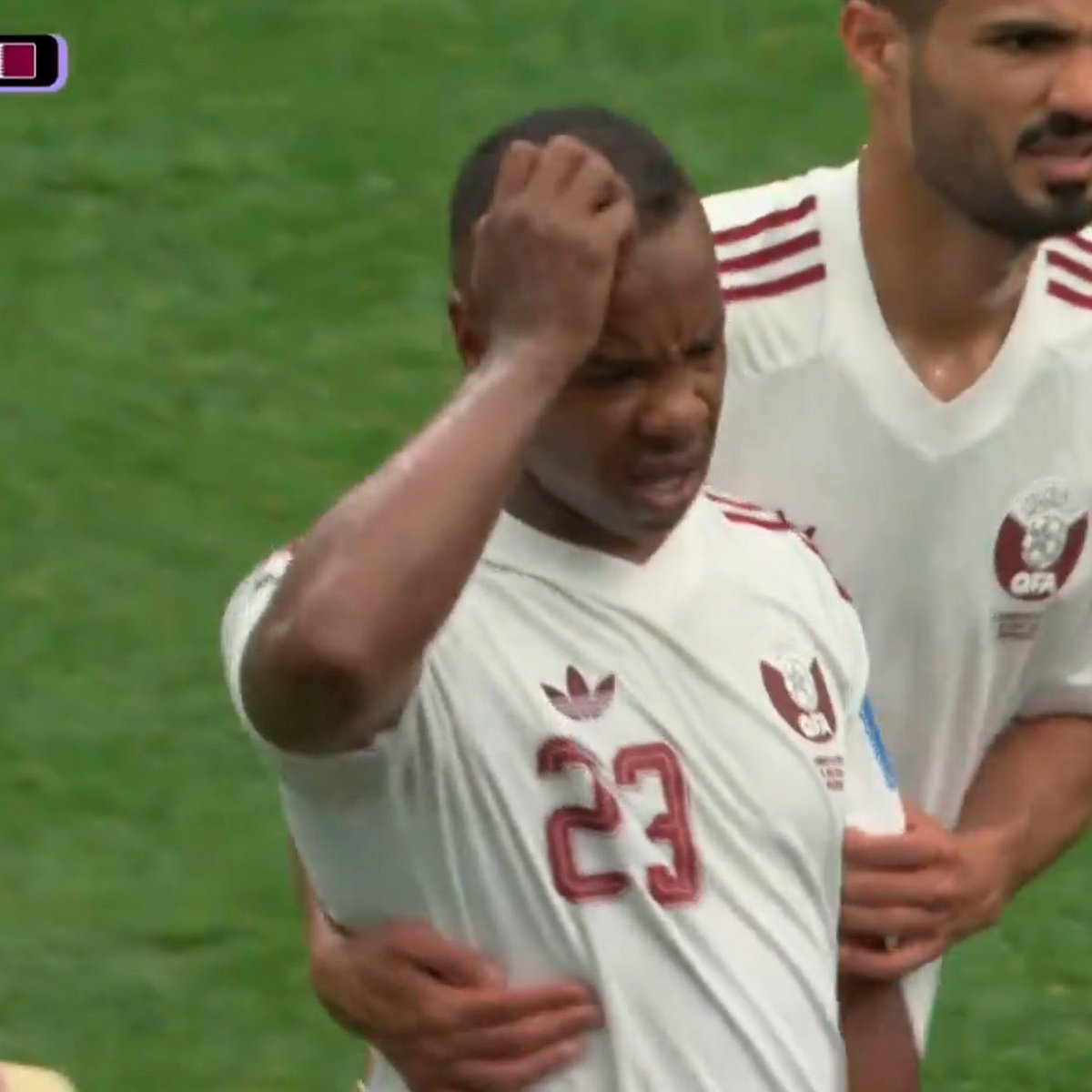 CanaduhOh's tweet photo. Qatar’s Assim Madibo given a red card for a play that fractured Ismael Koné’s leg. Doesn’t look great, prayers for Kone 🙏 https://t.co/xsy25Jjkv7