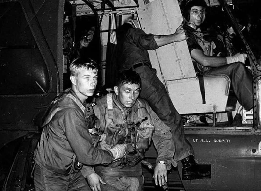 Noctisvelt's tweet photo. One of the most defining images of war trauma, captured in Vietnam, April 1965. 

The photograph shows a US soldier being evacuated after intense combat, capturing the immediate psychological impact of battle. https://t.co/o7Z2zIjx4g