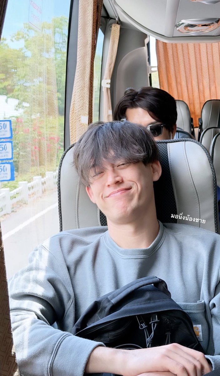 wYluvTaec's tweet photo. After watching the livehouse outing, I came up with this theory:

[Speculation] 
Joss probably knew from the start that Gawin was going to stay behind after the costume party, drink some wine, and have fun with everyone. That's why he brought a shirt for Gawin to wear (even if I'm not there, everyone will still know YOU ARE MINE 🫠) 

And on top of that, Gawin literally said the shirt still smelled like Joss 🙃This isn't the first time Gawin has worn Joss's clothes, BUT THIS IS THE FIRST TIME HE HAS EVER MENTIONED JOSS'S SCENT ON THE SHIRT. WHY?????? 

As for the photo on the bus where Gawin was sitting in front and Joss was sitting behind, maybe Gawin hadn't gotten enough sleep and the seats were too cramped, so Joss intentionally moved to the back to let Gawin rest more comfortably (maybe he was slightly sulking cuz Gawin stayed out until dawn before going back to his room, but he still took care of him anyway🥺)

If you've noticed, Joss has brought up Gawin's habit of sleeping late and waking up late at least three times already => that makes me think he's genuinely concerned about Gawin's health.

Which brings us to the "sea bass witnessed everything" photo aka aka Joss's subtle little sulk cuz Gawin stayed out having fun until sunrise 😂😂

So, in conclusion:
No matter how you look at it, it all comes down to one thing that he's just worried about his baby 🐻🐧
#JossGawin