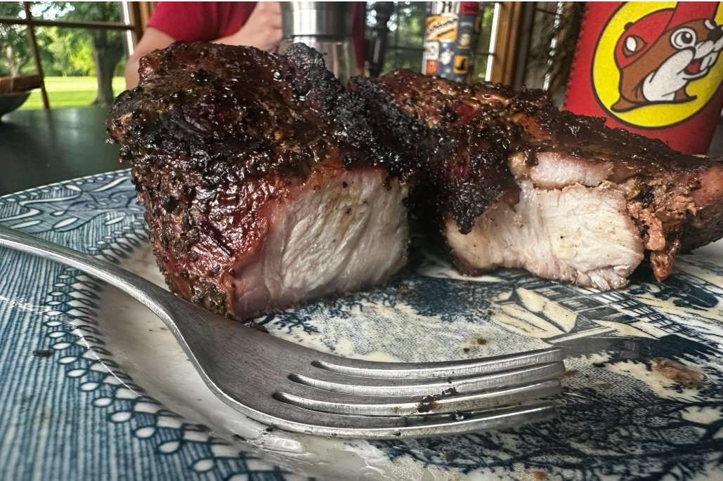 ProfKirke's tweet photo. Pork country ribs just off the Weber. I use high heat to char the outside a bit then turn, put on the lid and keep checking them to internal temp of 145. Seasoned right, they are almost as good as a NY strip steak. https://t.co/ow9btSRcLD