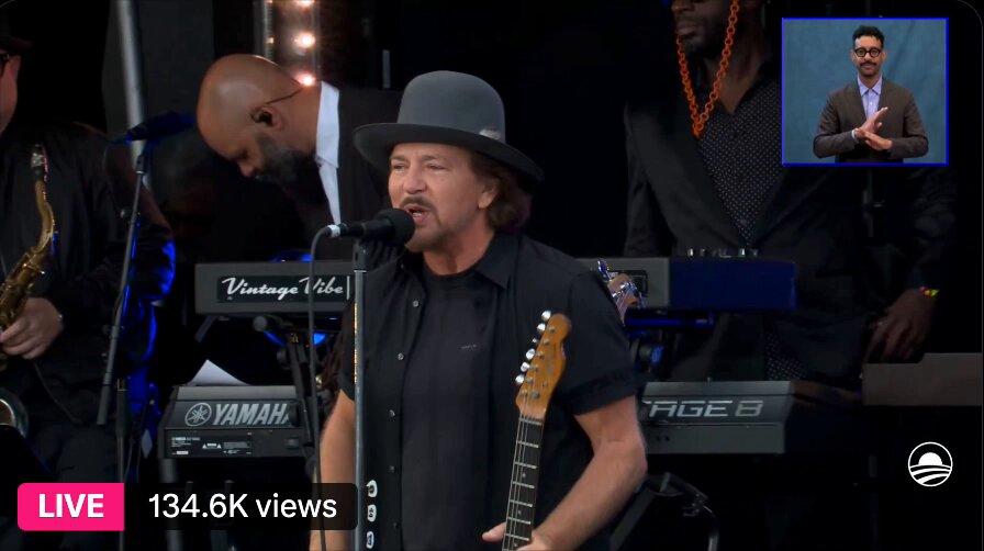 micyoung75's tweet photo. Eddie Vedder could have walked onto that stage tonight, played the catalog, taken his bow, and gotten on a plane. Nobody would have complained. The crowd would have gone home happy. That would have been enough.

Instead he spent real time with teenage kids from Chicago's South Side, helping them write something that didn't exist before they walked into a room together, rehearsing it until it was ready, and then stepping back while they sang it in front of three former presidents of the United States.

That's not a cameo. That's not a tax-deductible appearance. That's somebody deciding that the most important thing he could do with his access was hand it to someone who didn't already have any. The kids on that stage tonight will carry what happened there for the rest of their lives. That's the part that doesn't show up in the lineup announcement.