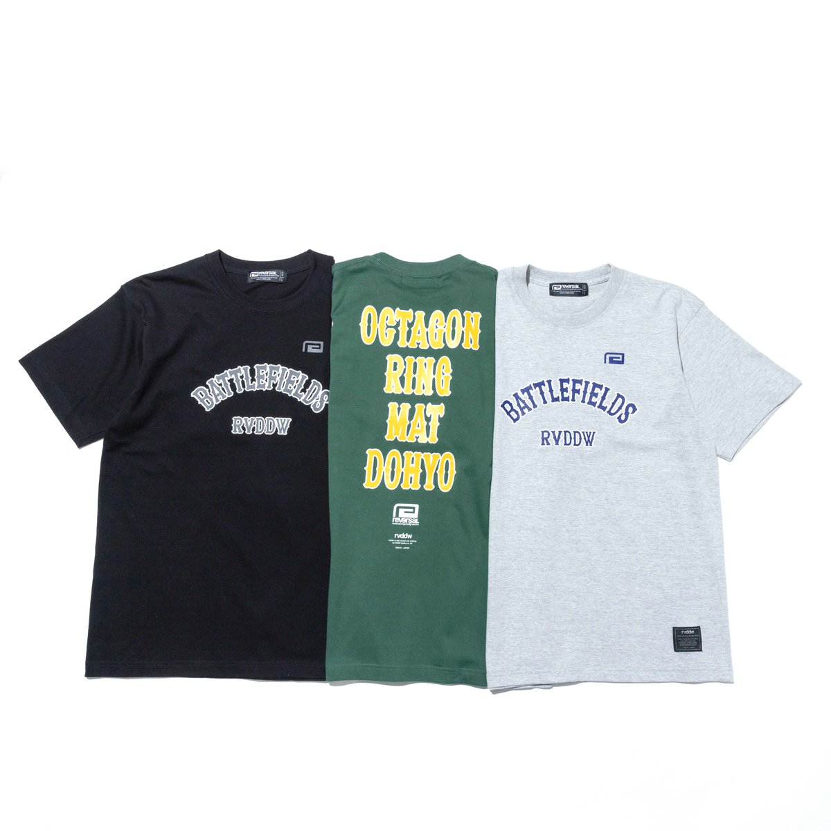 rvddw's tweet photo. 【NEW】「BF COLLEGE COTTON TEE」
キャッチーなカラーリングのカレッジ風デザインのコットンTEE ですが、背中にはOCTAGON/RING/MAT/DOHYO と、闘いの場（Battlefields）が表現された、背中で語るrvddw らしい1 枚。
https://t.co/hDx9wYtPTg #rvddw https://t.co/mCWrqWyRch