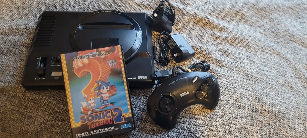 Shadow2638's tweet photo. After so long I was able to finally seek out and by my very own sega mega drive!
I can finally relive my childhood and play my first ever video game back when I was very young.
It was nice feeling young again when I booted the game up 😊 https://t.co/sbDv7LXP6W