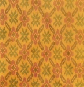 ANI's tweet photo. Gift given by PM Narendra Modi to Brigitte Macron, wife of French President Emmanuel Macron | Pochampally Silk Stole: The Pochampally Silk Stole is a handwoven textile from Telangana, made using the traditional Ikat resist-dyeing technique. Known for its intricate geometric and floral patterns, fine craftsmanship, and elegant design, it showcases India's rich textile heritage.