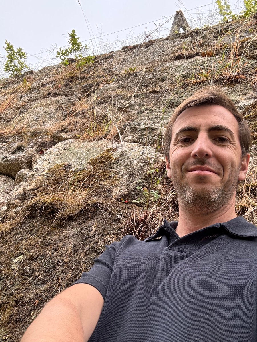 facebwine's tweet photo. Your's truly near one of the granite stone walls of our farm that is the origin of Moon Juice White. We just sold our first bottle of white of this still to be launched very serious wine. Granite soil meets mountain altitude! https://t.co/awyccKba3S