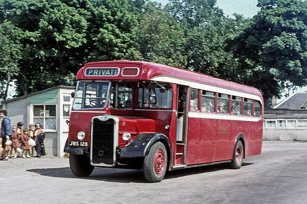 HighlandHistory's tweet photo. A bus taking #Brownies on an outing from #Nairn Bus Station, 27 June 1964

[photo: John Sinclair] https://t.co/OXkqaKtXtd
