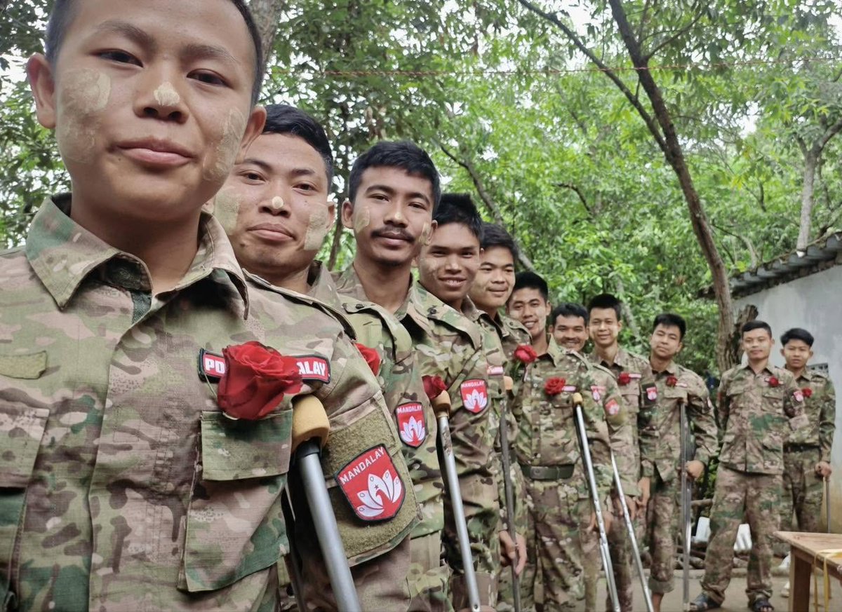 IrrawaddyNews's tweet photo. Resistance fighters from the Mandalay People’s Defense Force have joined the ‘Rose Campaign’ to mark the 81st birthday of detained democracy leader Daw Aung San Suu Kyi. Citizens across Myanmar and abroad are holding red roses to demand her release from regime detention.
#WhatsHappeningInMyanmar