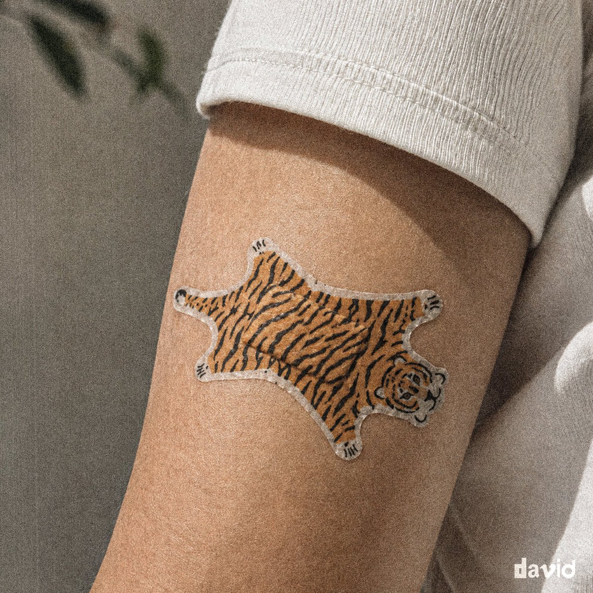 Delahuntagram's tweet photo. Band-Aids in the design of animal rugs https://t.co/c7qaADUhhz