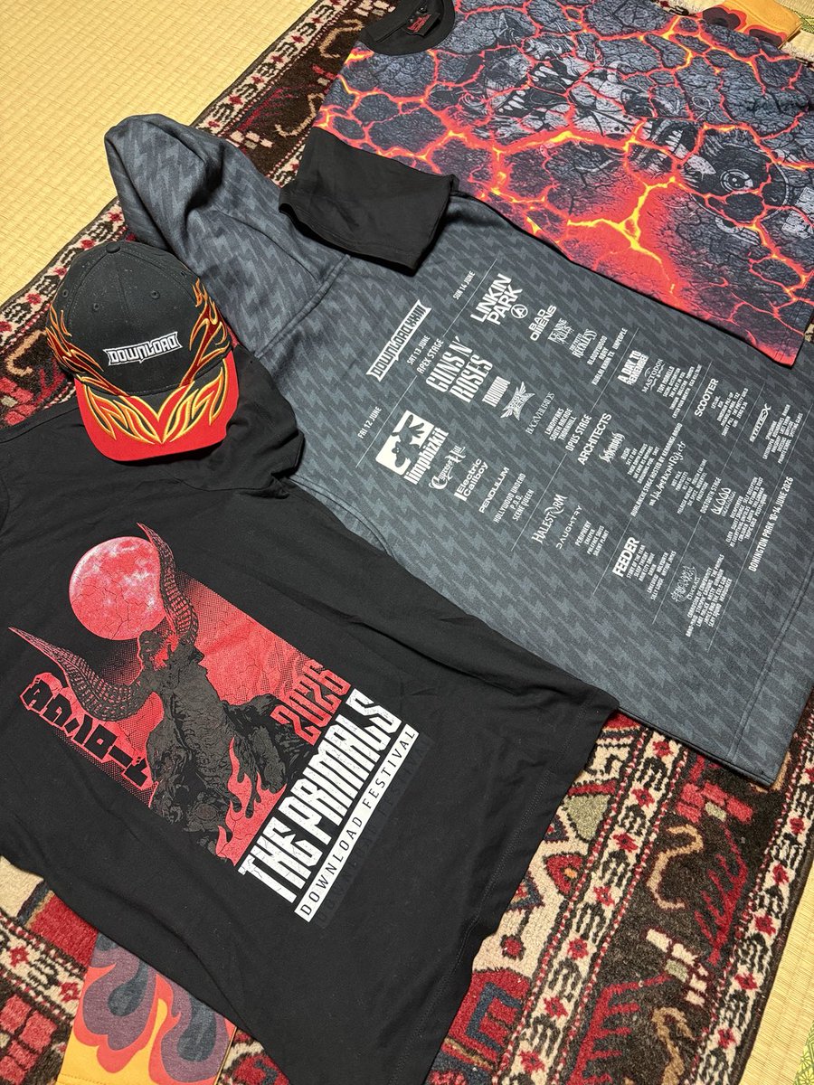F_Freeeman's tweet photo. Part 5 – What I brought home from Download Festival 2026.

After returning to Japan, I finally had time to lay everything out and look back on an unforgettable weekend.

From official Download Festival merchandise, to exclusive FFXIV booth items, guitar picks, stickers, a Fat Cat coin bank kindly gifted to me by a fellow Warrior of Light who won it at the FFXIV booth claw machine, and other souvenirs from the event — every item reminds me of the amazing people I met and the memories I made.

Some of these items will be kept as treasured souvenirs, while others will be shared with friends who support THE PRIMALS and FFXIV.

Thank you to everyone who made this experience special.

#PrimalsDownload #DLXXIII
#THEPRIMALS #FFXIV