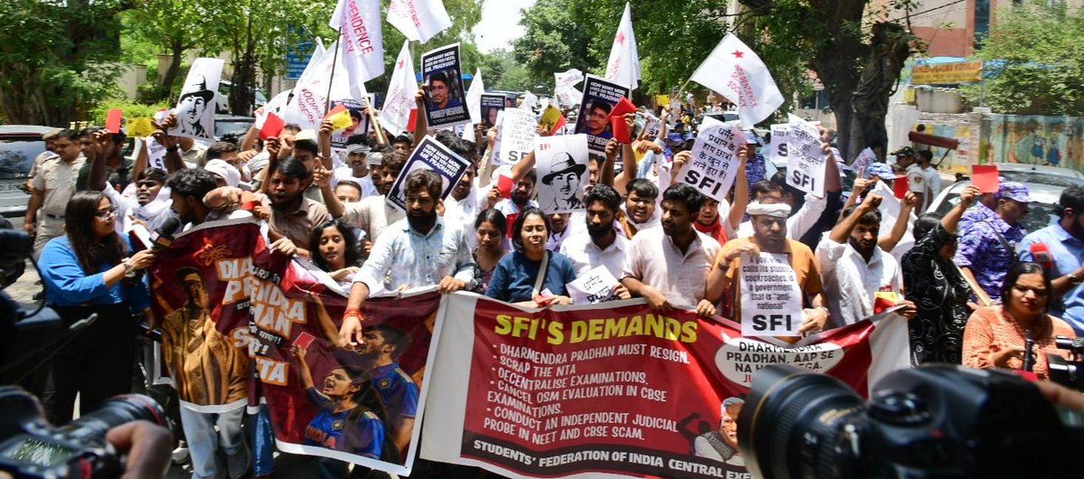 cpimspeak's tweet photo. The Students Federation of India led a militant protest march to the Ministry of Education in New Delhi today demanding the immediate resignation of Dharmendra Pradhan, scrapping of the National Testing Agency, decentralization of examinations, independent judicial probe into the NEET and CBSE scams, punishment of all culprits, and fair compensation for all affected students. Hundreds of students from different states resolutely marched forward despite the heavy deployment of police forces and barricades along the march route by the Delhi Police, raising slogans against the anti-student policies of the BJP-RSS-led government and demanding accountability for the unprecedented collapse of educational governance under Dharmendra Pradhan's tenure.

A four member delegation comprising SFI All India General Secretary Srijan Bhattacharyya, President Aadarsh M Saji, Joint Secretary Aishe Ghosh and Vice President Shilpa proceeded to the Ministry of Education and submitted a memorandum demanding  the immediate resignation of Dharmendra Pradhan and highlighting the severe crisis confronting students across the country. The delegation emphasized that recurring paper leaks, examination irregularities, arbitrary administrative decisions, and the government's failure to ensure transparency and accountability have severely undermined the credibility of the education system.

The delegation also issued a clear ultimatum stating that if Dharmendra Pradhan fails to resign and if the Government of India does not address the demands raised by students across the country, SFI will intensify its agitation until justice is secured for all affected students. The protesters resolved to mobilize students nationwide in the coming weeks and to strengthen the struggle on the streets in order to defend students’ rights and save public education.