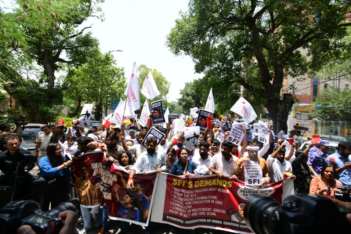 cpimspeak's tweet photo. The Students Federation of India led a militant protest march to the Ministry of Education in New Delhi today demanding the immediate resignation of Dharmendra Pradhan, scrapping of the National Testing Agency, decentralization of examinations, independent judicial probe into the NEET and CBSE scams, punishment of all culprits, and fair compensation for all affected students. Hundreds of students from different states resolutely marched forward despite the heavy deployment of police forces and barricades along the march route by the Delhi Police, raising slogans against the anti-student policies of the BJP-RSS-led government and demanding accountability for the unprecedented collapse of educational governance under Dharmendra Pradhan's tenure.

A four member delegation comprising SFI All India General Secretary Srijan Bhattacharyya, President Aadarsh M Saji, Joint Secretary Aishe Ghosh and Vice President Shilpa proceeded to the Ministry of Education and submitted a memorandum demanding  the immediate resignation of Dharmendra Pradhan and highlighting the severe crisis confronting students across the country. The delegation emphasized that recurring paper leaks, examination irregularities, arbitrary administrative decisions, and the government's failure to ensure transparency and accountability have severely undermined the credibility of the education system.

The delegation also issued a clear ultimatum stating that if Dharmendra Pradhan fails to resign and if the Government of India does not address the demands raised by students across the country, SFI will intensify its agitation until justice is secured for all affected students. The protesters resolved to mobilize students nationwide in the coming weeks and to strengthen the struggle on the streets in order to defend students’ rights and save public education.
