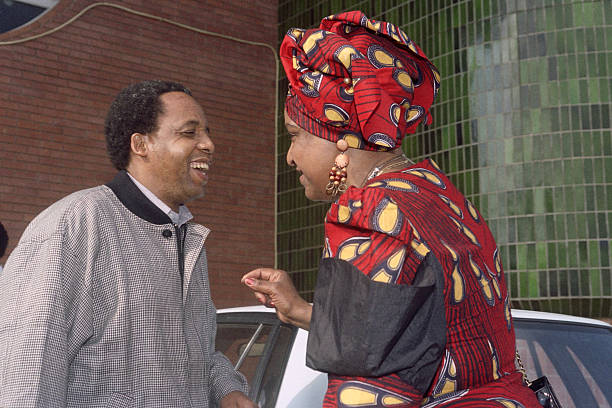 HistorySAZAR's tweet photo. Winnie Mandela chats with Chris Hani in Durban on July 03, 1991, on the second day of the ANC's national conference. Credit: Trevor Samson / AFP https://t.co/F2nrrbK4h1