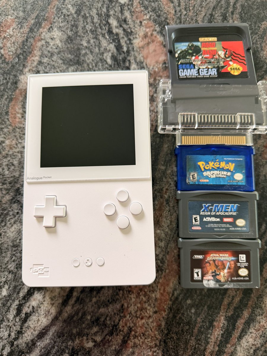 Tyrium's tweet photo. Father’s Day gift. 
Analogue Pocket. Updated re-creation of the GameBoy that’s compatible with every version type of GB games! Also has an adapter for  Game Gear games too! https://t.co/boDmbDPIxr