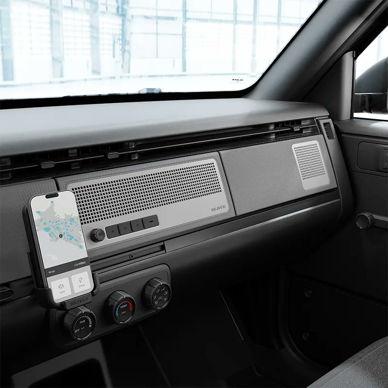 ahastings23's tweet photo. @slateauto I'm confused by the images of the installable speakers. On the website you show exposed speakers with a knob and 4 buttons, but in the personalizer it shows the speakers being installed behind the dash covers. Please explain the difference. https://t.co/Af5jvgxyjq