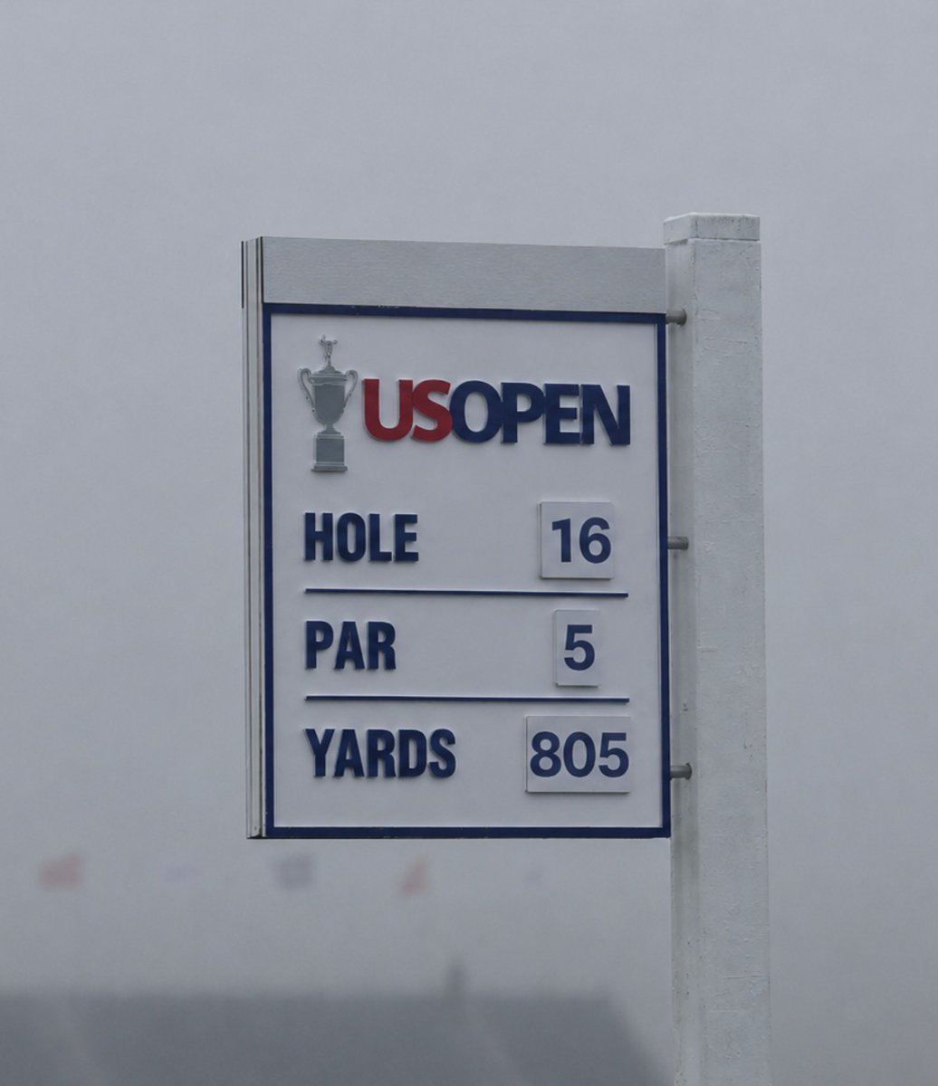 jamierkennedy's tweet photo. A 800-yard par five?!

Let me explain...

On Thursday, the 614-yard par five 16th hole played directly into the wind.

Bryson hit a 193mph drive (8.5 degree launch), a 148mph three wood (4.5 degree launch) and a 118mph 8-iron (19.5 degree launch). He still wasn't on the green but pin high. Using that data from Trackman, I calculated how far those shots would go in "normal" conditions.

The answer, 805 yards.