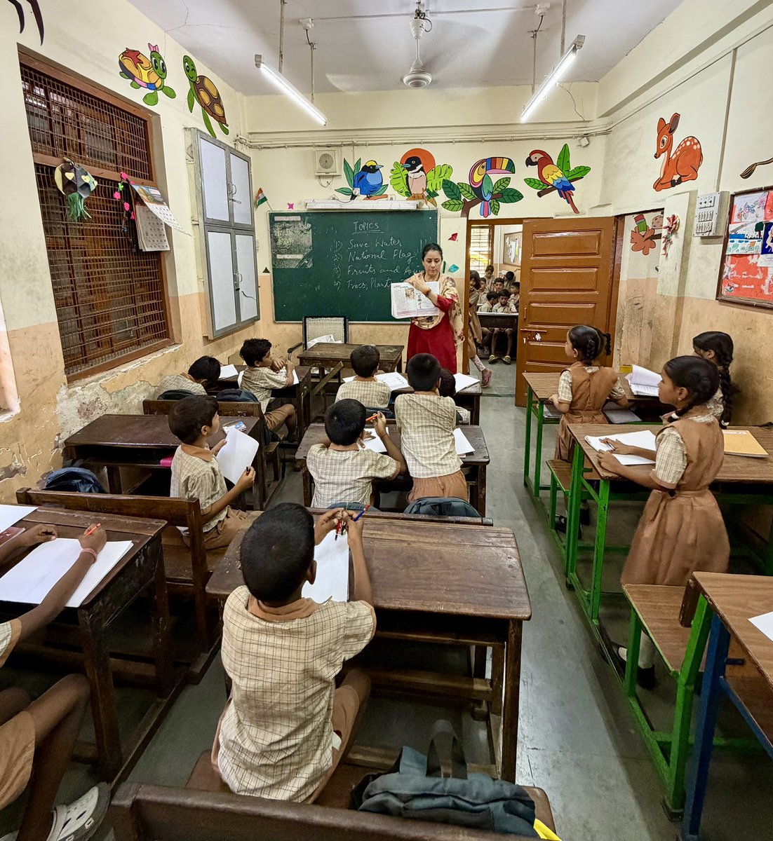 ROUBLENAGI's tweet photo. Today after the creative class, while spending time with children in a classroom, I found myself reflecting on a question that deserves honest discussion. Education is a public good, much like roads, public transport, parks, or healthcare. If a child can receive free education, textbooks, uniforms & a nutritious mid-day meal in a government school, why are so many parents still willing to spend a significant portion of their hard-earned income on private schooling? The answer is not simple, & it is not about blaming anyone. A developed nation is built not merely by enrolling children in classrooms, but by ensuring those classrooms inspire curiosity, confidence, creativity & opportunity. What would make every parent proudly choose a government school for their child? Where is it that we are succeeding & where is it that we still need to improve ? 
@RNAFMUMBAI @MisaalMumbai