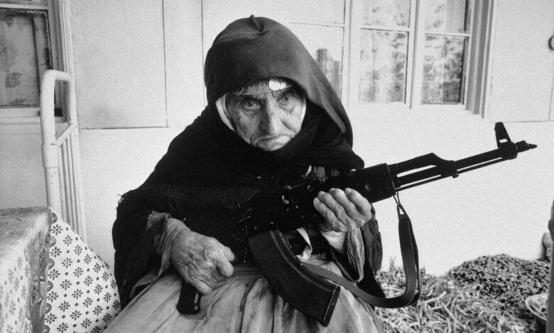 eyeonaxis's tweet photo. 106-year old Armenian woman guards her home with an AKM riffle, during the Nagorno-Karabakh conflict in the Degh village, near Goris, Armenia, 1990. photo by Armineh Johannes https://t.co/kIveyc5wj5