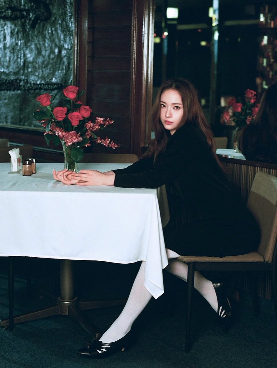 krystald's tweet photo. The roses borrowed all the color in the room, leaving the rest wrapped in shadows and quiet reflections. Beyond the glass, the city kept unfolding its endless stories, while I remained with my own. https://t.co/UlsVPoeEFi