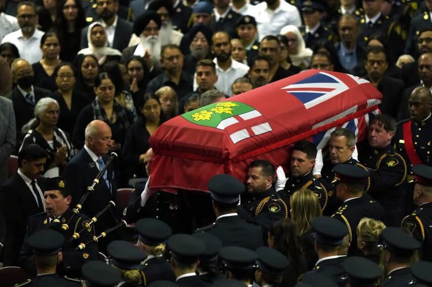 Tim_IQBAL's tweet photo. Yesterday, I joined thousands of Brampttonians and Ontarians in paying tribute to OPP Provincial Constable Tarun Bali and honouring a life defined by service, courage, and sacrifice.

Constable Bali's unwavering commitment to protecting others and serving his community will never be forgotten. Our thoughts and prayers remain with his family, friends, and fellow officers during this difficult time.

May his legacy of service continue to inspire future generations.

#OPP #TarunBali #NeverForgotten #ServiceAndSacrifice