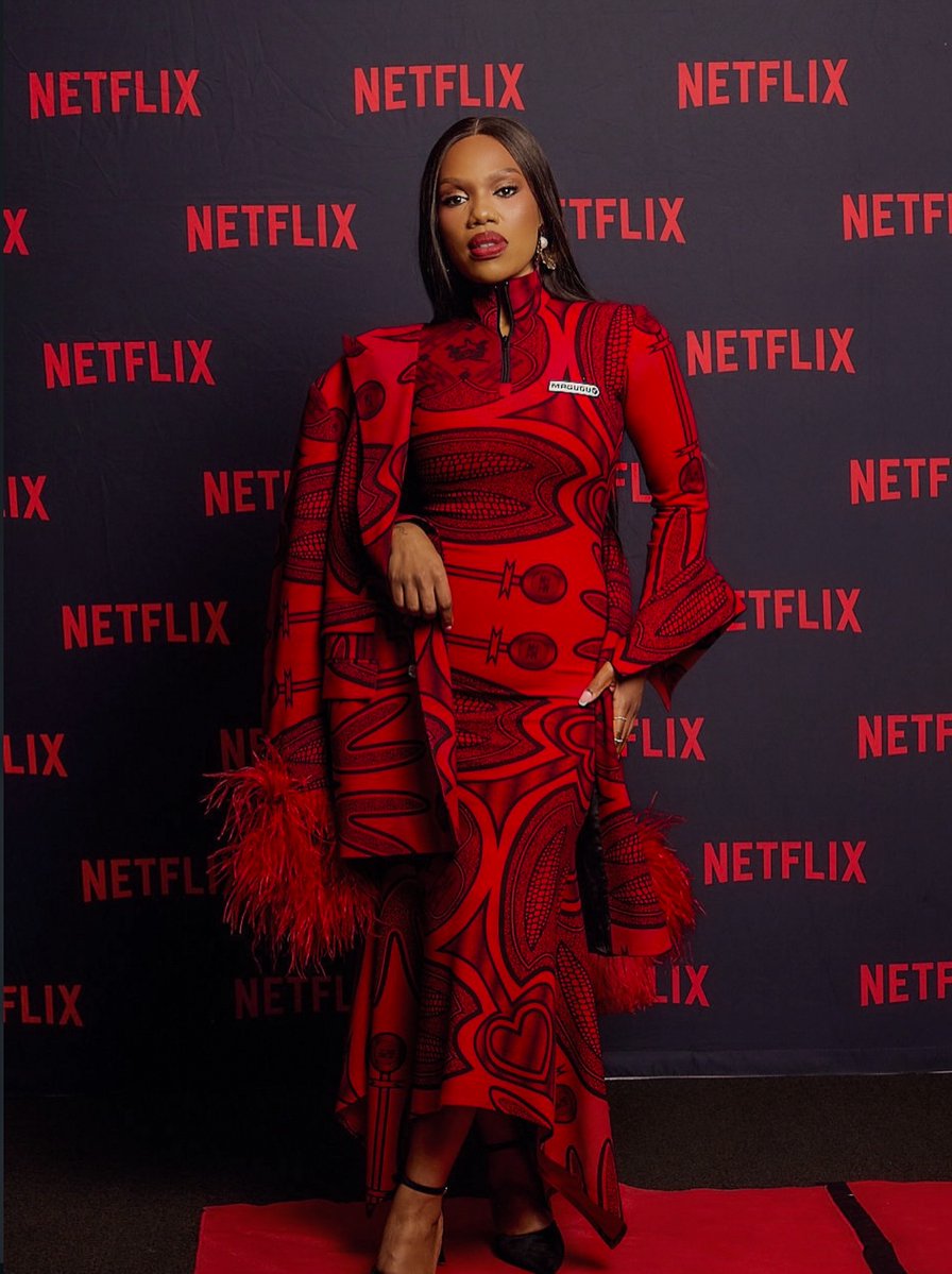 _ThebeMagugu_'s tweet photo. 'The Polygamist' stars Gugu Gumede and Luyanda Zwane wore Thebe Magugu to the Netflix series premiere. Gugu wore the Red Mafeteng Dress paired with the Ostrich Feather-Trimmed Mafeteng Double-Breasted Jacket, while Luyanda wore the Chartreuse Cascading Mini Dress. https://t.co/z63qB93rcE