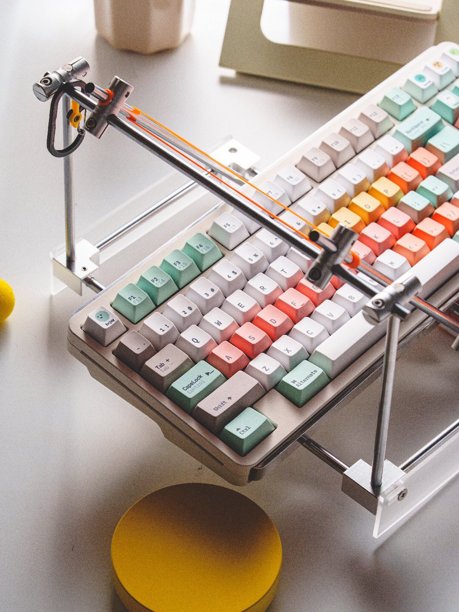KeysFusion's tweet photo. These light dopamine keycaps shouldn't work this well.

Fantasy Bean Cyber Lime. Gray base, mint green, coral pink, lemon yellow, orange. PBT Cherry Profile, dye-subbed legends, smiley face modifier keys included. https://t.co/j7cXXz5CRl