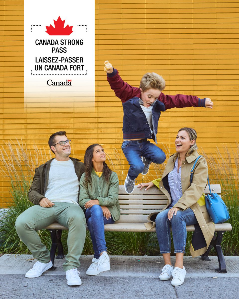 A family sitting on a bench in front of a wall with yellow slats. Three people are sitting, while a child is being photographed mid-jump over the bench. In the upper left corner, the Canada Strong Pass logo is visible.