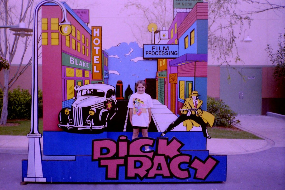 DTMoviePodcast's tweet photo. The first photo is of James's sister in front of one of these in 1991, the second photo is of Brian and his siblings the year earlier. Were there anymore?

#TalkingDick #TheDickTracyMoviePodcast
#DickTracy #DisneyFlorida #1990s https://t.co/YcID6jYdqQ