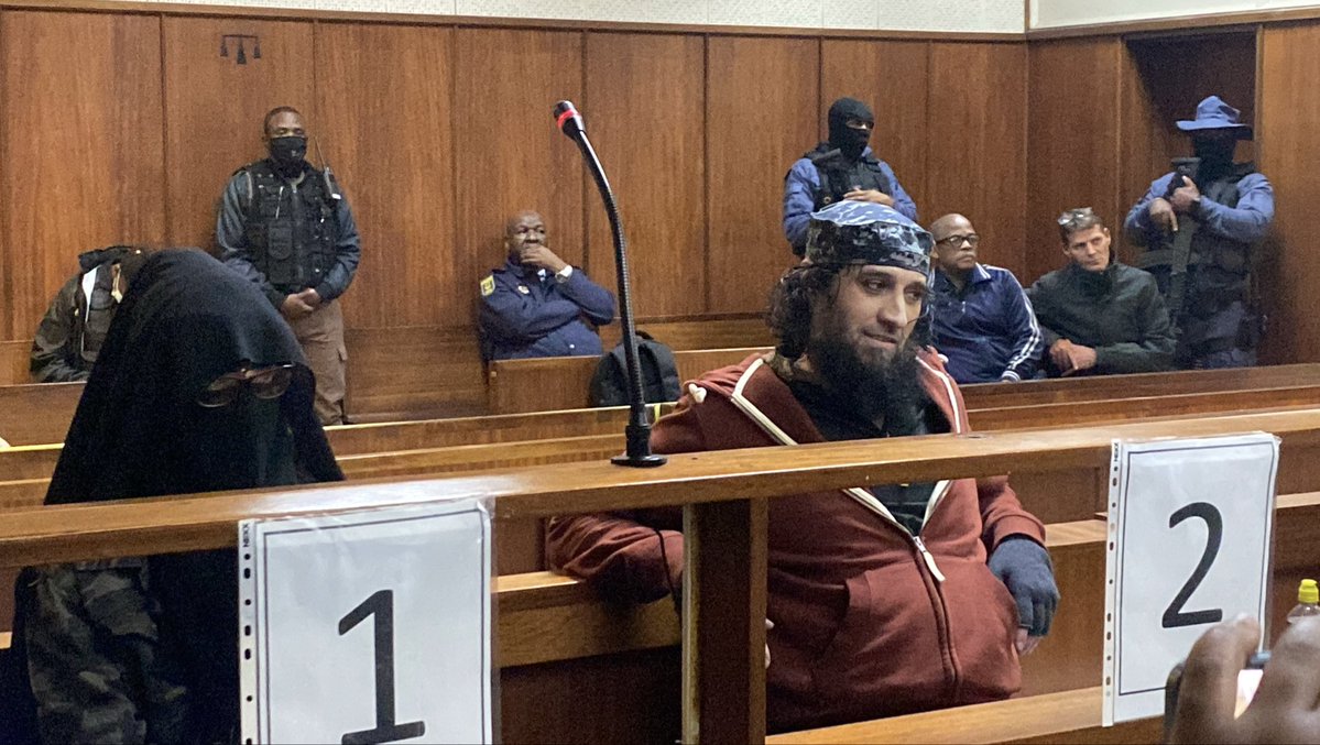 ECR_Newswatch's tweet photo. After more than a year of refusing to appear in court, convicted murderers Safydeen Del Vecchio and his wife, Fatima Patel, have walked into the dock. The duo, along with Ahmad Mussa have been found guilty of the kidnapping and murder of Rodney and Rachel Saunders. https://t.co/ZbNVBOjM9k