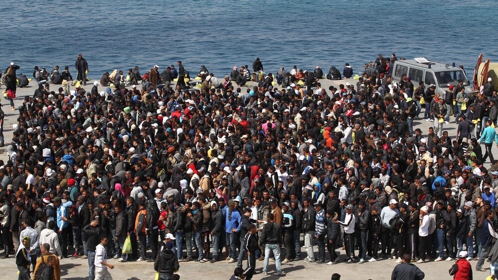 kate_p45's tweet photo. Giorgia Meloni has allowed Lampedusa, a tiny Italian island with just 6,000 residents, to be repeatedly overwhelmed by thousands of Muslim migrants from Africa, swamping local services, facilities, and the community. 
Boats keep landing, the hotspot center can’t cope, and transfers lag. 
This is what happens under her watch as PM.
This is who Marjorie Taylor Greene likes and supports. Of course she does. She stayed silent while 469,000 illegals were in Georgia and didn’t utter a word demanding their deportation.

@GiorgiaMeloni  has betrayed the Italian people.