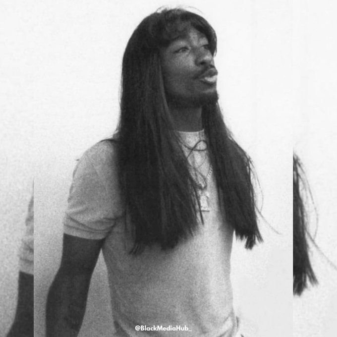 BlackMediaHub's tweet photo. Tupac Shakur wearing a Rick James style wig, 1996. https://t.co/7UKwzTvsy1