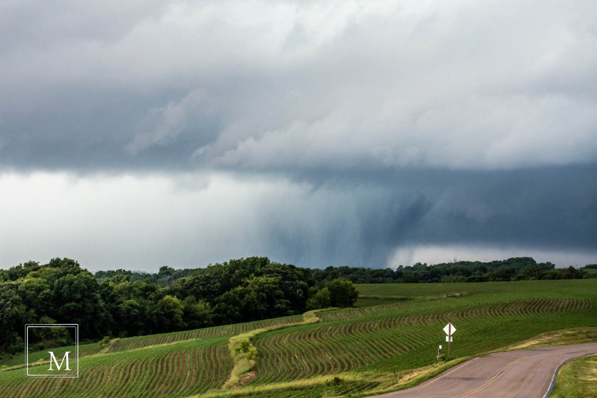 MarkRants's tweet photo. Rain wrapped EF2 tornado, approaching Highway 27 and County Highway F just north of Eastman, Wisconsin on June 17, 2026. The CC tornado debris signature passed directly over my position a few minutes later (marked by the "X" on the screen grab). https://t.co/NGGFwXXZmU