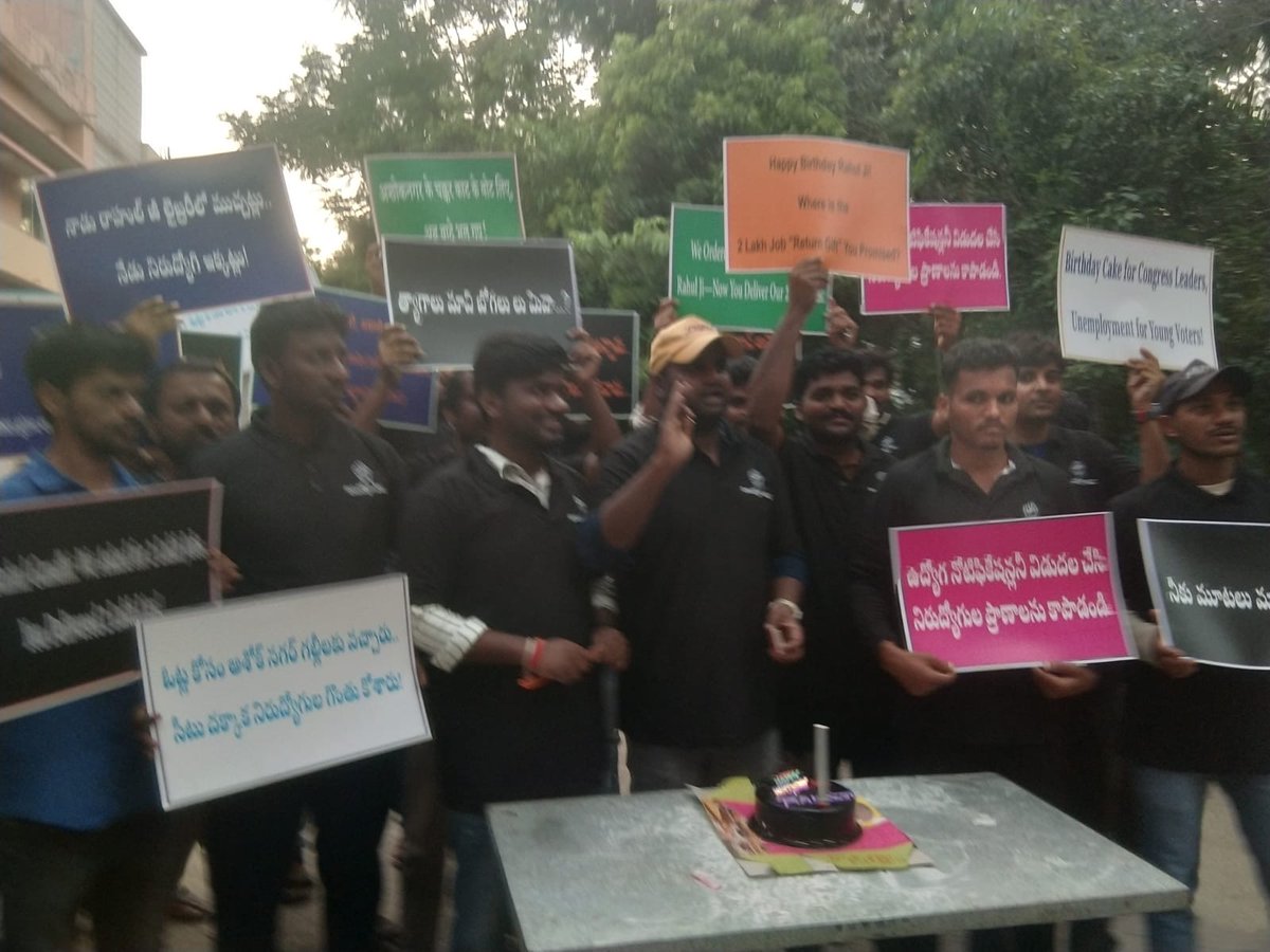 BJP4Telangana's tweet photo. The people of Telangana, particularly the youth wishes Rahul Gandhi a Happy Birthday! 🎂

Telangana youth cut a cake with placards asking for jobs, job calendar and unemployment allowance.

A birthday party where the guests brought the reminders, the youth brought the pain, and Congress brought the silence.

Rahul ji, don’t just work for your own progress, work for the progress of Telangana’s youth too.

As a return gift, please ask your Hitler admiring CM to deliver the jobs and unemployment allowance he promised.