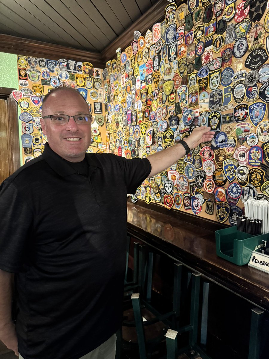 CaptReedBPD's tweet photo. If you are ever in San Antonio, TX look at the police patch wall in @DurtyNellyPub, today I added a @BellevuePolice patch to the wall!  @CityofBellevue https://t.co/PkRtDkVJWI