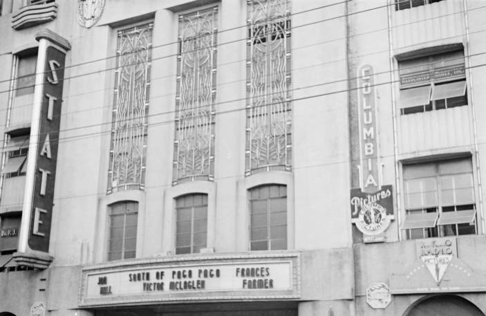 wanderingleon's tweet photo. State Theater on Rizal Avenue in Sta. Cruz, Manila. The marquee advertises the 1940 film South of Pago Pago starring Victor McLaglen, Jon Hall, and Frances Farmer. https://t.co/uHMojAt9NC