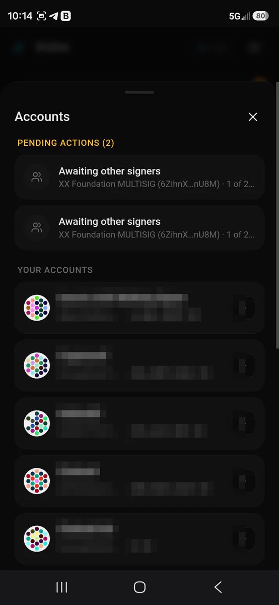 Accounts screen with a pending actions section showing signatures awaiting other signers.