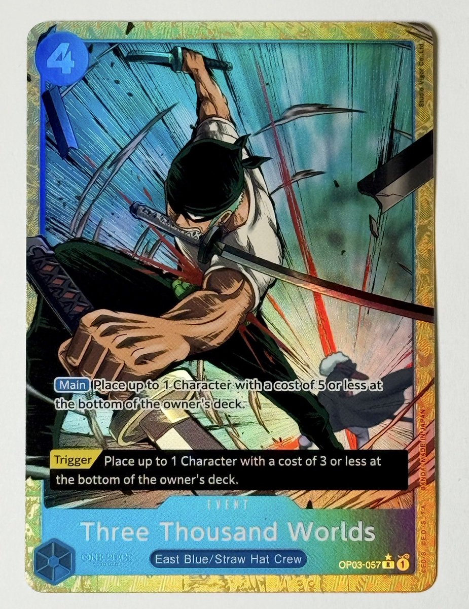 GrandLine_CLX's tweet photo. @KaizokuIceTCG hello, what it do - I like your videos.  One card I think could have some upside is the “Three Thousand Worlds” PRB01 Alt Art.  Shows the other POV from the upcoming One Piece PSA Magazine Promo.  #notfinancialadvice 🤫 https://t.co/XOoQYO4Ega