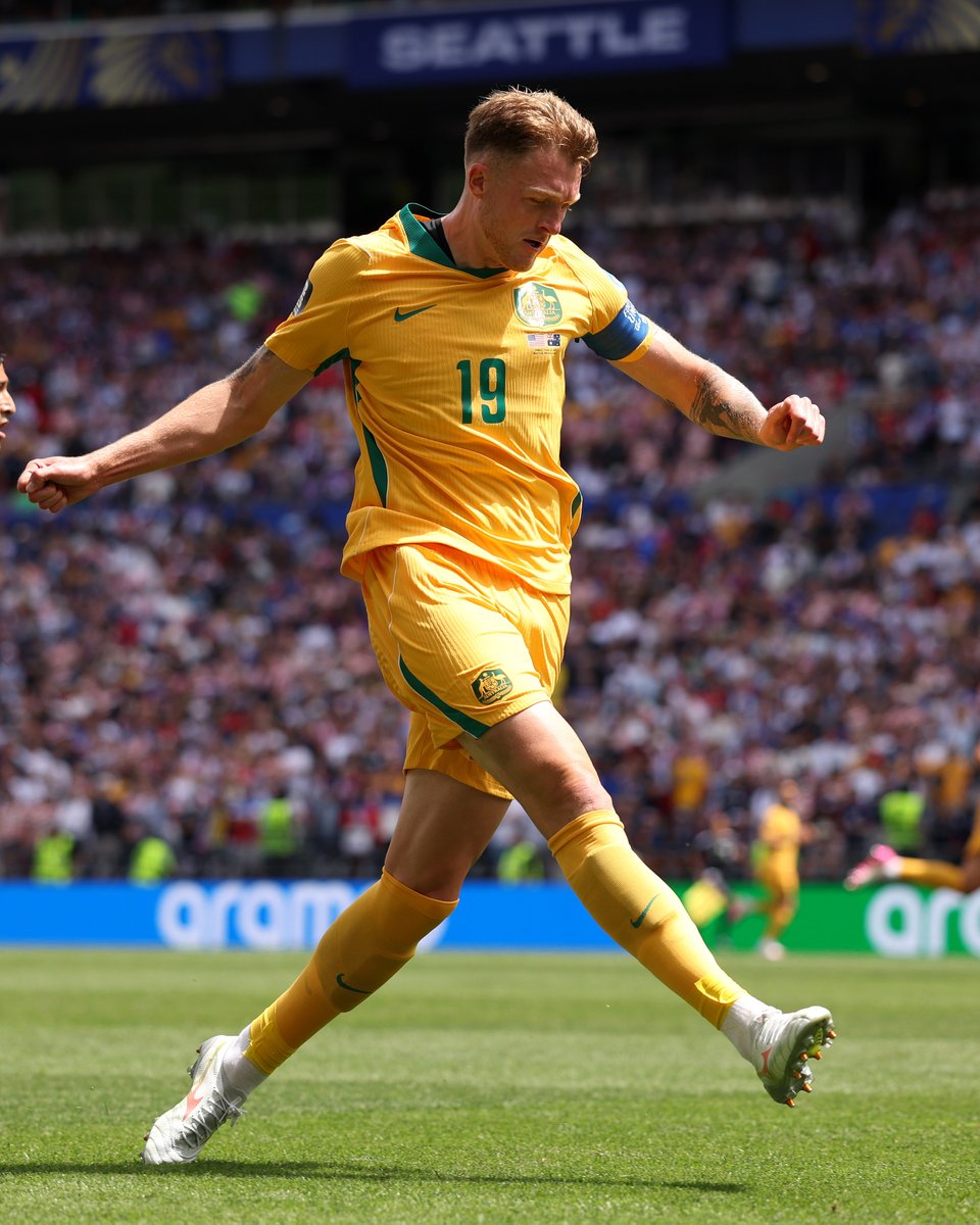 Harry Souttar carries the ball during Australia's FIFA World Cup fixture against the United States of America.