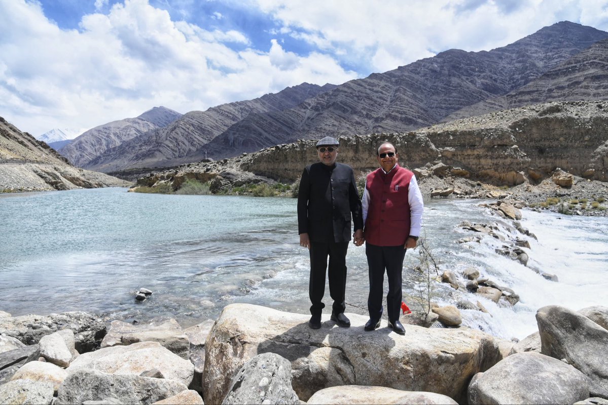 VPIndia's tweet photo. Vice President Shri C. P. Radhakrishnan today visited the first rock check dam on the Sindhu River at Upshi, Ladakh, constructed under the Sindhu Jal Samriddhi Abhiyan. He appreciated the eco-friendly and cost-effective initiative, conceptualised and inaugurated last month by the Lieutenant Governor of Ladakh, Shri Vinay Kumar Saxena, as an innovative solution to Ladakh’s recurring water challenges.

The pioneering project augments water levels in shallow stretches of the Sindhu River, enabling farmers to irrigate their fields during the crucial sowing season. The Vice-President noted that such sustainable and locally adapted interventions can significantly strengthen water security, support agricultural livelihoods, and contribute to the long-term development of the region.