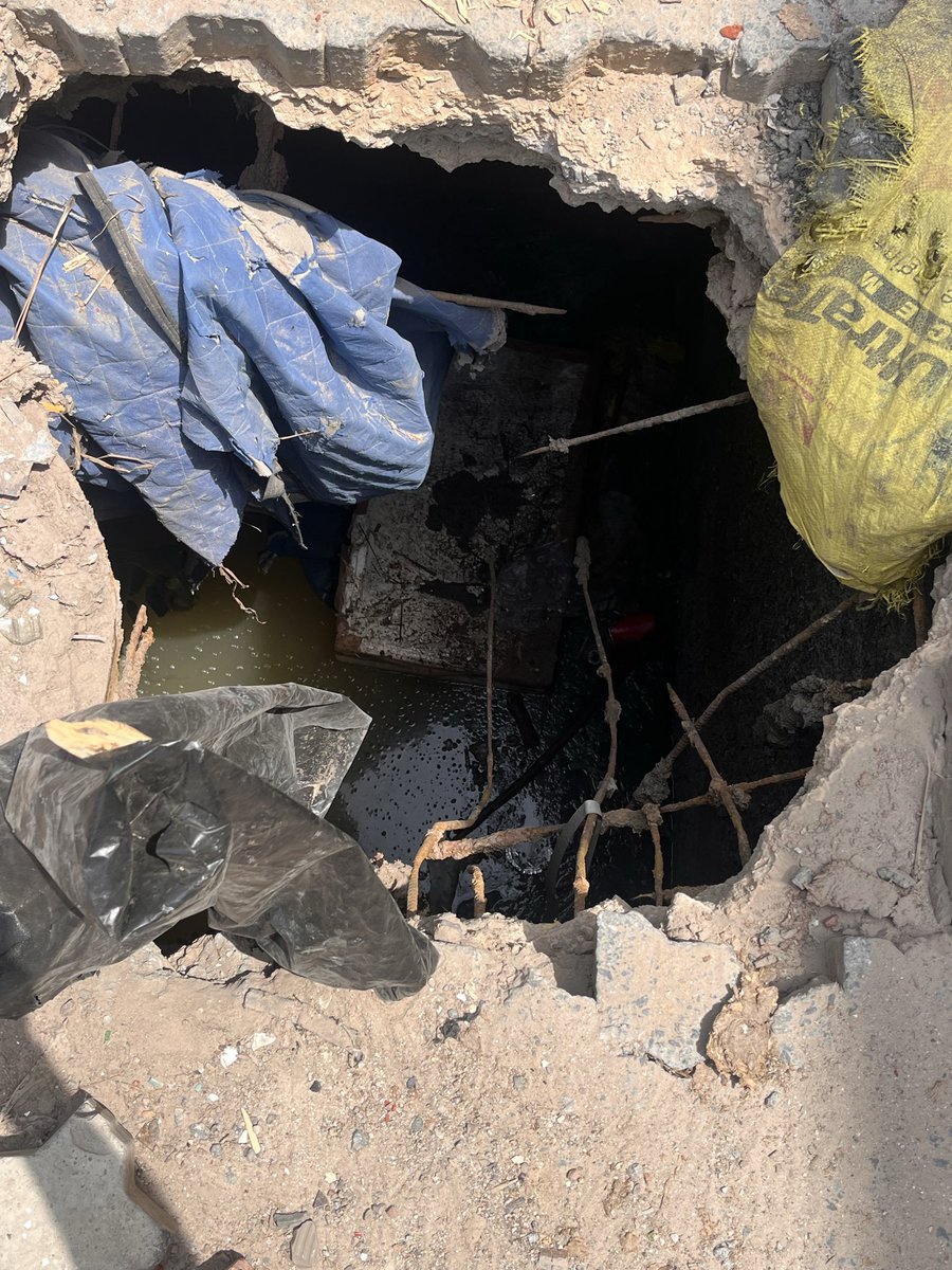 ILoveGurgaon_in's tweet photo. Dangerous sinkhole has developed on Bajghera Road, C1, Gupta Colony, Palam Vihar, #Gurugram. It has been temporarily covered to prevent an accident, but urgent permanent repairs are required before it leads to a serious or fatal mishap.

@MunCorpGurugram @CPCB_OFFICIAL
#Gurgaon https://t.co/3H7hitYmG8