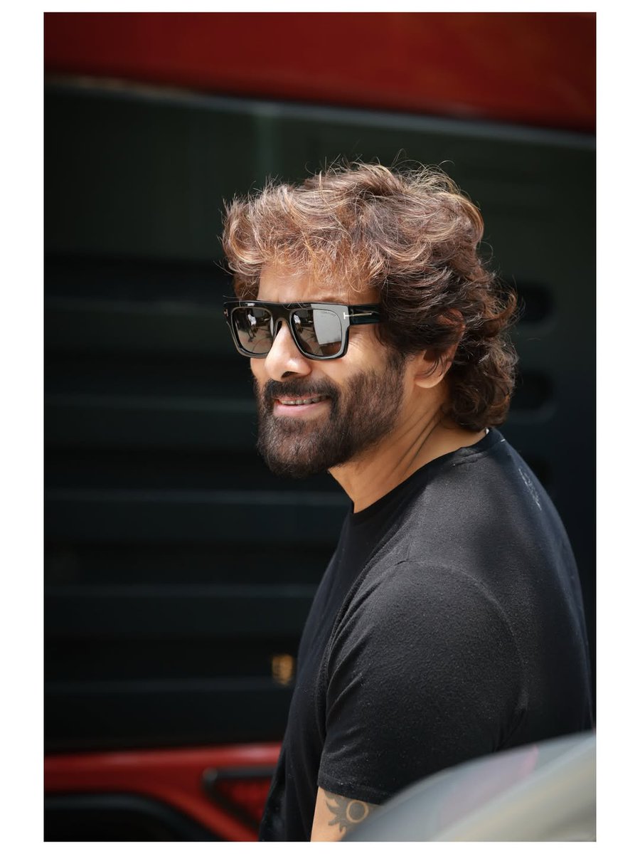 ChennaiTimesTOI's tweet photo. #ChiyaanVikram showcases the perfect blend of comfort and style in this chic blue jean and black t-shirt look.👖🖤 

#CasualStyle #StyleGoals #Vikram https://t.co/zu60GJK5nM
