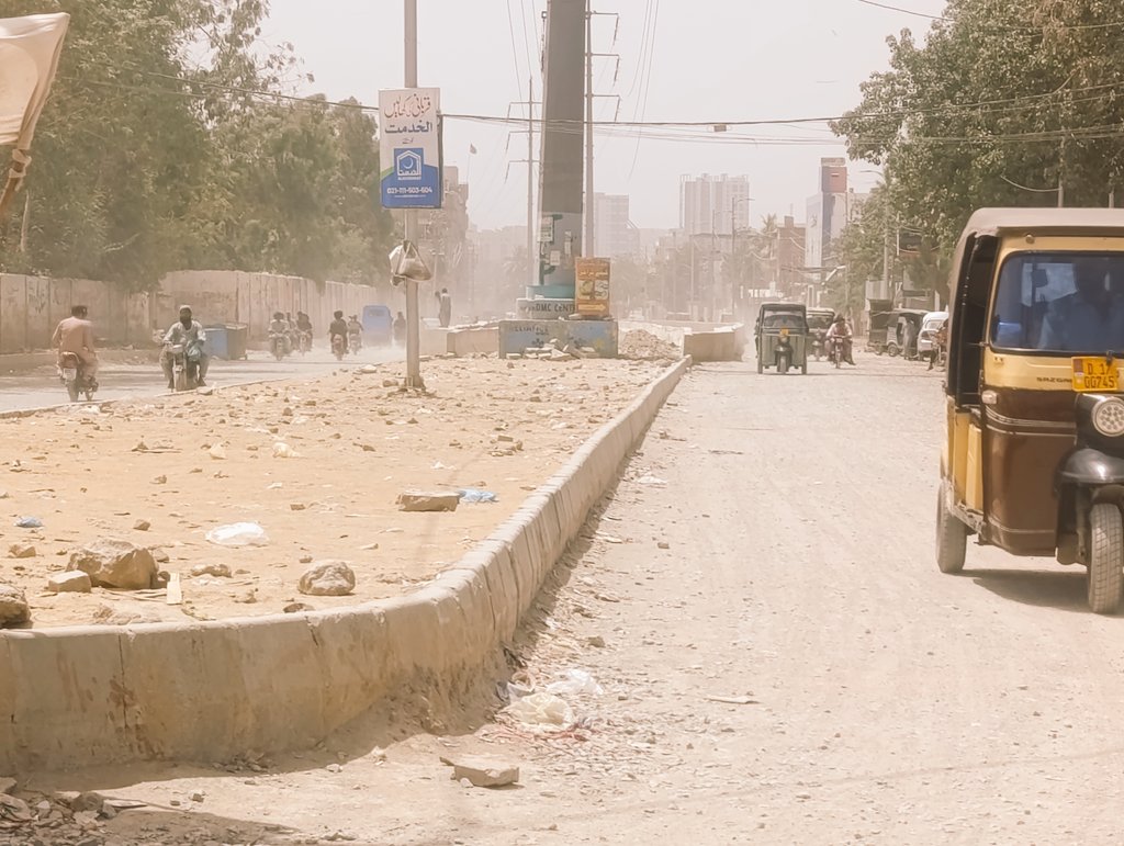 decentsilk's tweet photo. Karimabad Underpass is still not completed. The top road is still not carpeted. It's a mega project and the development work is completely stopped after it's opening. KDA should complete it and then do the beautification work. The soil is full of stones where no plant will grow https://t.co/R09YQ97vGE