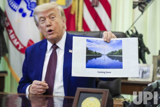 darkspot's tweet photo. @karolineleavitt I wonder who was so focused on the Reflecting Pool... or pond, or lake.. he's never quite sure... https://t.co/r53ksiIc0p
