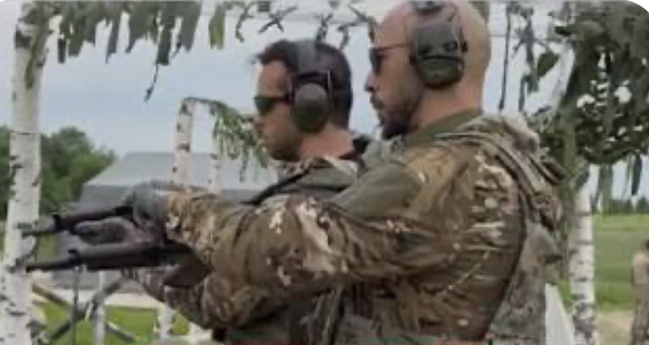 ChuckPfarrer's tweet photo. BUSTED: Andrew Tate and his brother Andrew, self-proclaimed macho men and 'alfalfa males', underwent military training during a recent trip to Russia.  Today, they were indicted by Romanian prosecutors for charges of rape, human trafficking and organizing a criminal group. https://t.co/VIjoq3PmvH