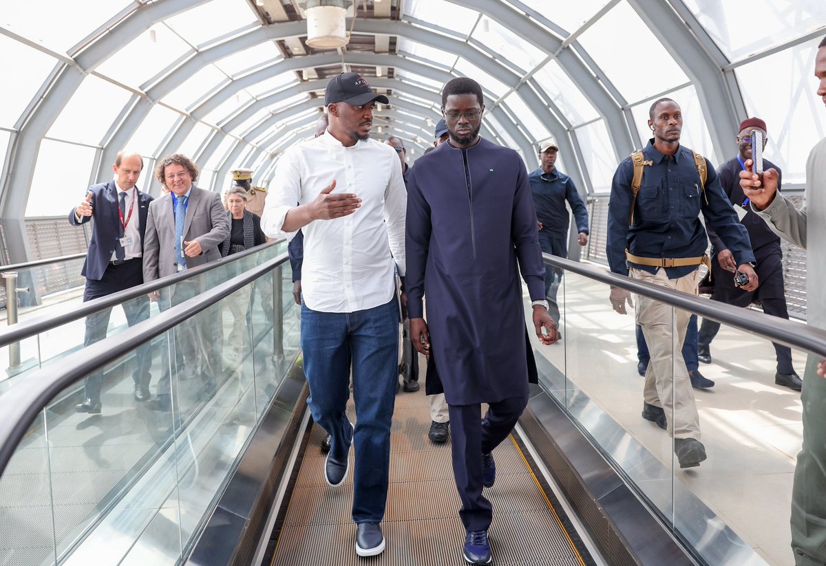 PR_Senegal's tweet photo. Le @PR_Diomaye a parcouru le TER jusqu’à AIBD, via le nouveau tronçon Diamniadio-AIBD,lancé les travaux de la gare de Sébikotane,puis inauguré l'usine AVCI à Diamniadio. Le rail qui relie les territoires et l'usine qui transforme notre coton, voilà la #VisionSN50 qui prend corps. https://t.co/1fpTpO43Jp