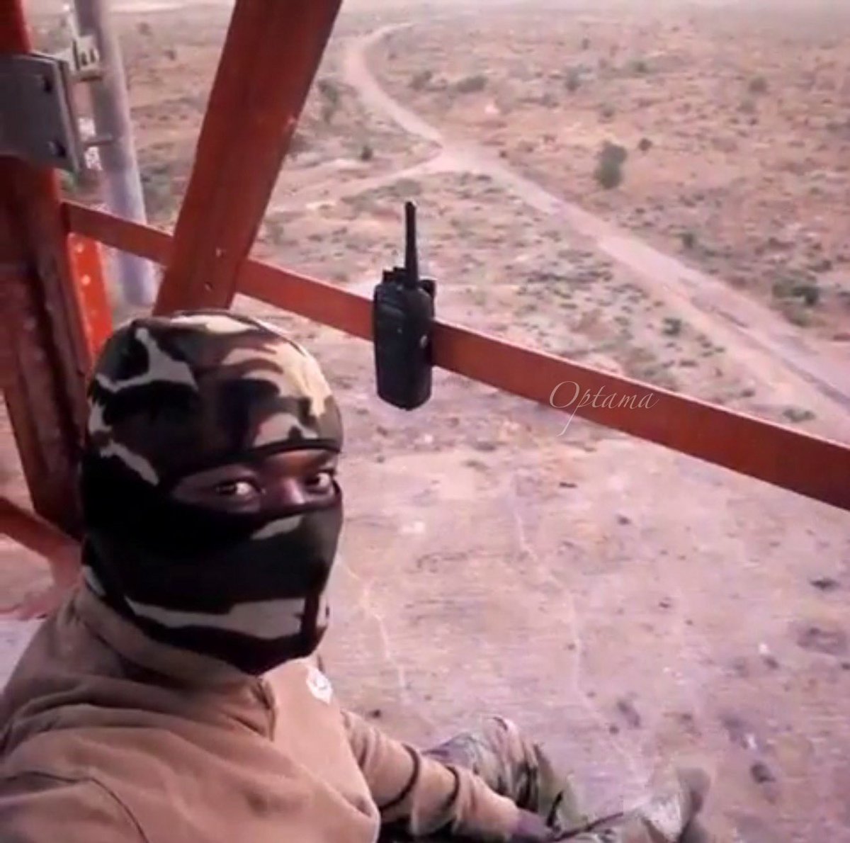 optama's tweet photo. ——————

Picture Three and Four

By the time we arrived in my FOB, many of the communities these masts had been built to serve no longer existed. 
But while the network infrastructure had become redundant, We utilized the abandoned telecom masts structures We turned them into Observation Posts.

Because Delwa sits outside the main Maiduguri metropolis, the telecommunications masts along the corridor were built much higher than those commonly found in urban areas. Their height allowed signals to travel across open terrain and scattered settlements.

The mast in this picture stood somewhere between 150 and 200 feet high. Since we were only taking advantage of the elevation for observation purposes, no climbing harnesses or safety equipment were provided.
My oga, @Tubash97 sha dey always buy us milk🤣

So I usually just make sign of the cross and start climbing.
(I got some gloves and jacket at CMS under-bridge for this particular assignment.)

The climb wasn’t for everyone. In fact, it wasn’t something you could simply order a soldier to do. Only a handful of us volunteered for the duty.

Every few levels, you’d stop to rest before continuing the ascent. From the top, people looked like ants and vehicles appeared as tiny moving termites along the road below😅

We had radios, binoculars, and night-vision goggles. We maintained communication with other locations along the route and monitored convoy movements while scanning for potential threats along the corridor.

The night shifts were always the hardest.

The wind never stopped. It howled through the steel structure, and during storms, the slim top part of the mast would bend to the will of the weather. The bolts would creak, and the structure would sway just enough to remind you how far away the ground really was.

There was always someone up there.

Rain o, sun o, harmattan dust o. thunderstorms o, someone was always up there watching.

My first day on that tower was also the first day I saw an insurgent with my own eyes.

I remember spotting movement in the distance, watching carefully to confirm what I was seeing, and then alerting the team on the ground.

I came across the pictures today and I remembered the long days, longer nights, endless climbs, cold winds, and a handful of buddies that I was lucky enough to share seats with, at hundreds of feet above the ground, watching over a road that had become a lifeline for thousands of people.

The story is long. This is just a part.
Now before I write out what is supposed to be an excerpt from a book project that only God knows when I’ll return to, let me stop here.