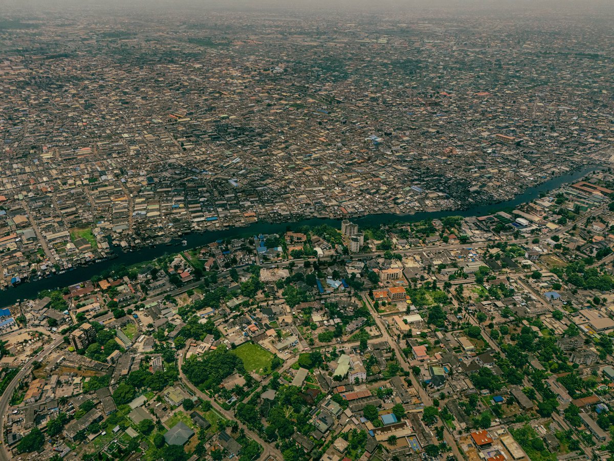 ihamadwil's tweet photo. A city divided by water, but connected by stories.

From above, Lagos reveals a quiet contrast, one side wrapped in greener landscapes and open spaces, the other carrying the weight, rhythm, and density of millions of lives.

A river separates two worlds, but both sides breathe. https://t.co/CdMuWdMI1p