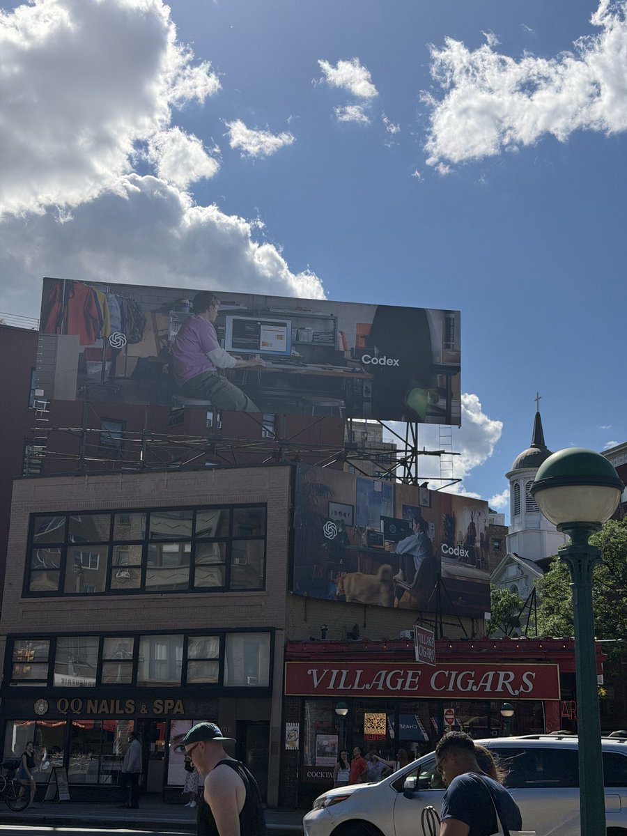 ParkerOrtolani's tweet photo. OpenAI changing over their ChatGPT billboards in the city to Codex ones https://t.co/LVV3jrQuZC